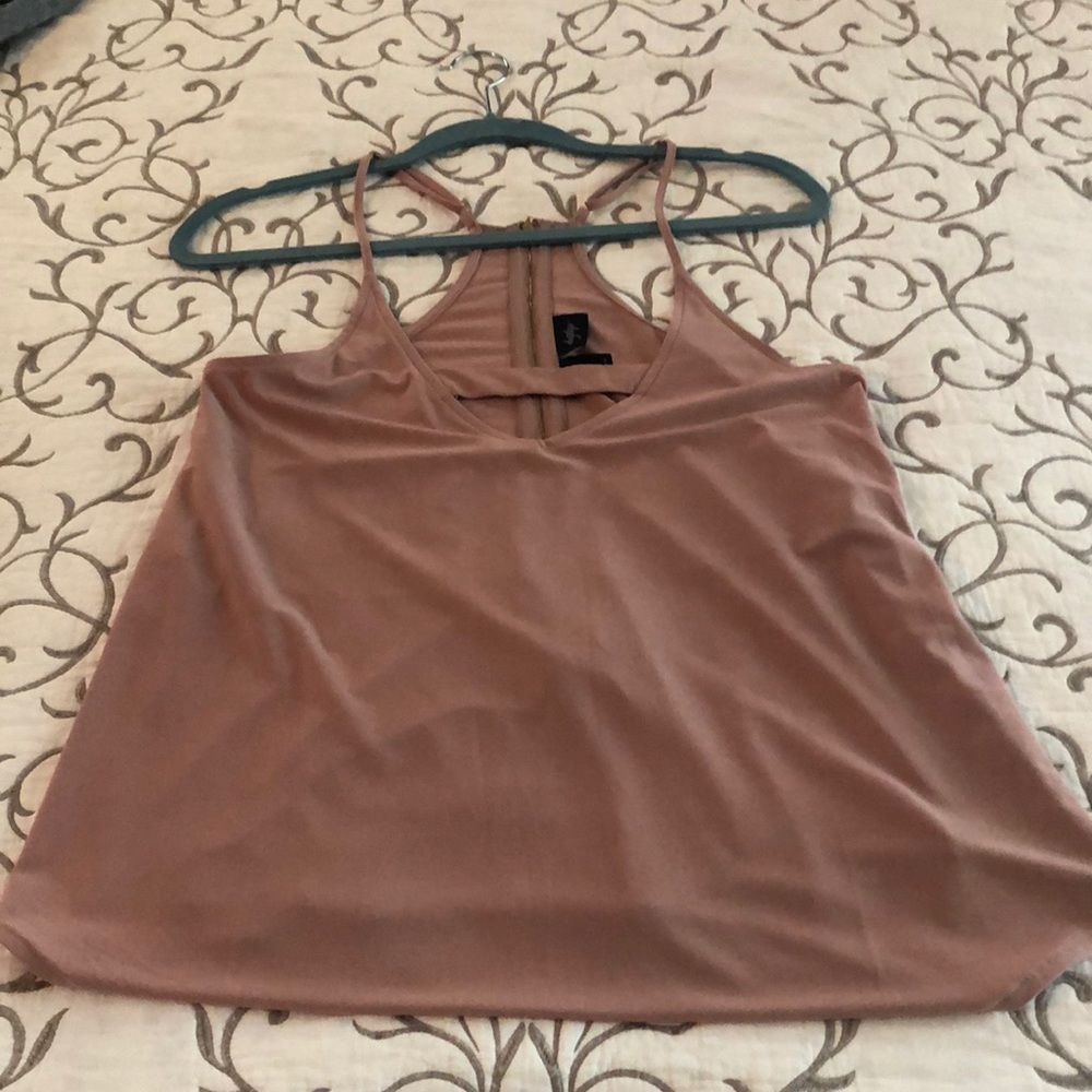 Cute day trip tank with cutout detail.